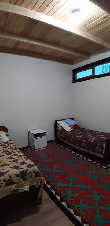 Фото номера Трехместный номер Гостевой дом Guest House Guljan г. Bokonbayevo 4