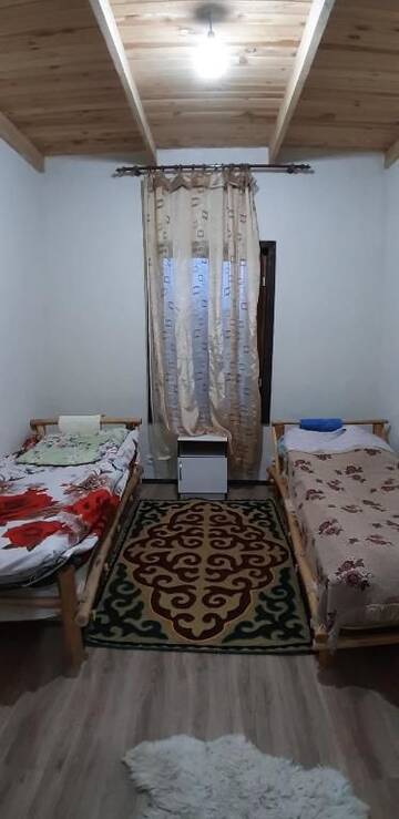 Фото номера Двухместный номер с 2 отдельными кроватями Гостевой дом Guest House Guljan г. Bokonbayevo 6