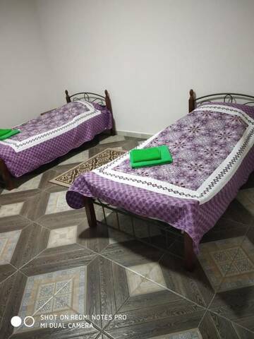 Фото номера Двухместный номер с 1 кроватью Отель Taj Altyn Hotel г. Bokonbayevo 7